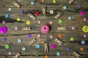 colorful buttons on wooden background photo