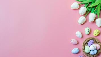 Happy easter, Top view of Easter eggs and tulip flower on pink color backgroud photo