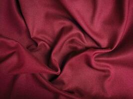 Fabric texture of natural cotton, wool, silk or linen textile material. Rose gold fabric background photo