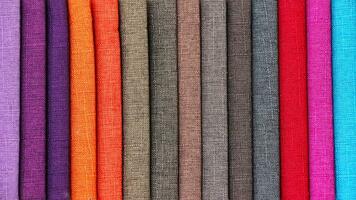 Colorful background, A stack of colorful fabric. photo