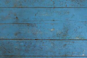 Close up texture of old blue wooden background photo