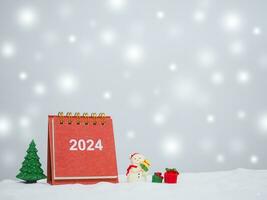 Close up calendar and christmas decoration with shiny light for New Year and Christmas 2024 concept. photo