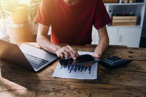 Business Man Financial Inspector and Secretary Making Report, Calculating or Checking Balance. Internal Revenue Service Inspector Checking Document Audit Concept photo