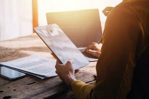 Business Man Financial Inspector and Secretary Making Report, Calculating or Checking Balance. Internal Revenue Service Inspector Checking Document Audit Concept photo