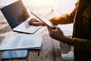 Business Man Financial Inspector and Secretary Making Report, Calculating or Checking Balance. Internal Revenue Service Inspector Checking Document Audit Concept photo