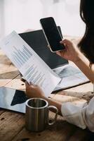 Business Man Financial Inspector and Secretary Making Report, Calculating or Checking Balance. Internal Revenue Service Inspector Checking Document Audit Concept photo