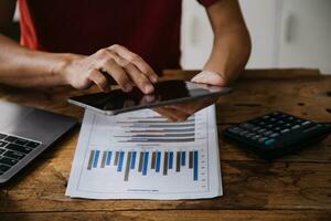 Business Man Financial Inspector and Secretary Making Report, Calculating or Checking Balance. Internal Revenue Service Inspector Checking Document Audit Concept photo