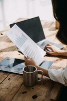 Business Man Financial Inspector and Secretary Making Report, Calculating or Checking Balance. Internal Revenue Service Inspector Checking Document Audit Concept photo