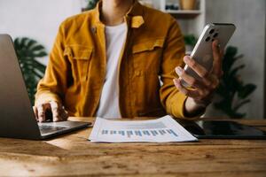 Business Man Financial Inspector and Secretary Making Report, Calculating or Checking Balance. Internal Revenue Service Inspector Checking Document Audit Concept photo