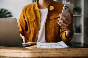 Business Man Financial Inspector and Secretary Making Report, Calculating or Checking Balance. Internal Revenue Service Inspector Checking Document Audit Concept photo
