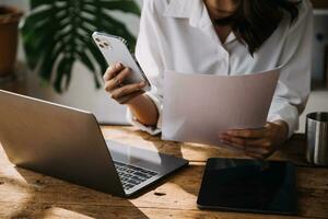 Business Man Financial Inspector and Secretary Making Report, Calculating or Checking Balance. Internal Revenue Service Inspector Checking Document Audit Concept photo