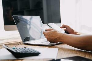 Businesswoman hands holding cradit card and using credit card online shopping. Online shopping concept photo