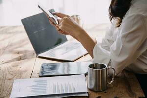 Business Man Financial Inspector and Secretary Making Report, Calculating or Checking Balance. Internal Revenue Service Inspector Checking Document Audit Concept photo