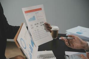 Team of business people working together in the meeting room office, teamwork background charts and graphs banner, double exposure successful teamwork,business planning concept. photo