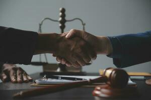 Customer service good cooperation, Consultation between a Businessman and Male lawyer or judge consult having team meeting with client, Law and Legal services concept. photo
