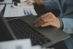Financial Business team present. Business man hands hold documents with financial statistic stock photo, discussion, and analysis report data the charts and graphs. Finance Financial concept photo