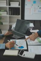 Financial Business team present. Business man hands hold documents with financial statistic stock photo, discussion, and analysis report data the charts and graphs. Finance Financial concept photo