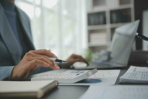 Financial Business team present. Business man hands hold documents with financial statistic stock photo, discussion, and analysis report data the charts and graphs. Finance Financial concept photo