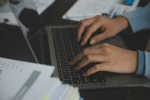 Financial Business team present. Business man hands hold documents with financial statistic stock photo, discussion, and analysis report data the charts and graphs. Finance Financial concept photo