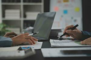 Financial Business team present. Business man hands hold documents with financial statistic stock photo, discussion, and analysis report data the charts and graphs. Finance Financial concept photo