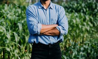 Agriculturist utilize the core data network in the Internet from the mobile to validate, test, and select the new crop method. Young farmers and tobacco farming photo