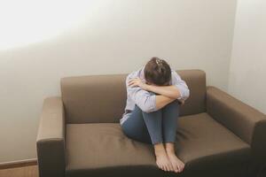 Sad, unhappy. Alone asian young woman, girl expression face thinking about problem, difficulty, feeling failure and exhausted, suffering from loneliness, grief sorrow and bad relationship or break up. photo