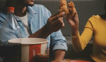 fat woman bite piece of pizza,overweight female is eating fast foods,asian girl is hungry photo