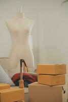 Business woman with friend working online for selling and e-commerce business. Freelancer at home for startup and SME entrepreneur. photo