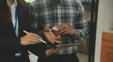 Audit concept,Administrator business man financial inspector and secretary making report calculating balance. Internal Revenue Service checking document. photo