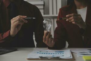 Inspiration. hand hold light bulb for good idea. brainstorming creative idea. photo