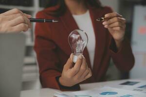 Inspiration. hand hold light bulb for good idea. brainstorming creative idea. photo
