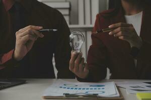 Inspiration. hand hold light bulb for good idea. brainstorming creative idea. photo
