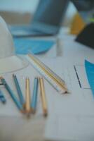 Construction and structure concept of Engineer or architect meeting for project working with partner and engineering tools on model building and blueprint in working site, contract for both companies. photo