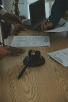 Consultation and conference of Male lawyers and professional businesswoman working and discussion having at law firm in office. Concepts of law, Judge gavel with scales of justice. photo