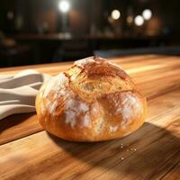 Freshly baked bread on wooden table photo