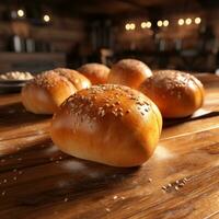 Freshly baked bread on wooden table photo