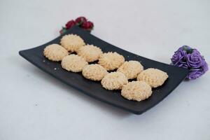 sweetmeat made from coconut milk and sugar photo