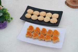 sweetmeat made from coconut milk and sugar photo