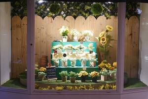 Flower shop display with flowers and plants photo