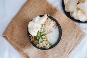 Rice porridge with chicken, indonesian style food photo