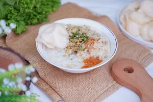 Rice porridge with chicken, indonesian style food photo