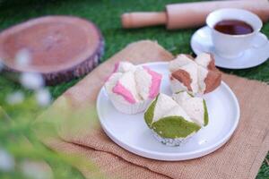 Bolu kukus is an Indonesian traditional sponge cupcake photo