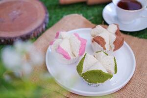 Bolu kukus is an Indonesian traditional sponge cupcake photo