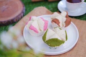 Bolu kukus is an Indonesian traditional sponge cupcake photo