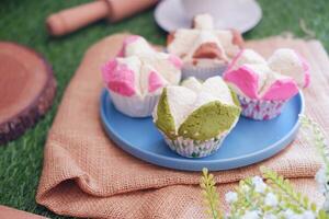 Bolu kukus is an Indonesian traditional sponge cupcake photo