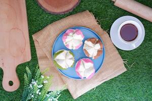 Bolu kukus is an Indonesian traditional sponge cupcake photo