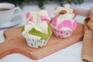 Bolu kukus is an Indonesian traditional sponge cupcake photo