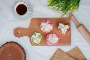 Bolu kukus is an Indonesian traditional sponge cupcake photo