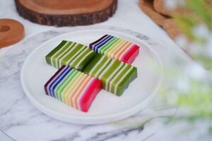 Kue Lapis or or Rainbow sticky layer cake, Indonesian traditional dessert photo