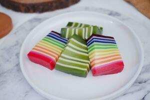 Kue Lapis or or Rainbow sticky layer cake, Indonesian traditional dessert photo